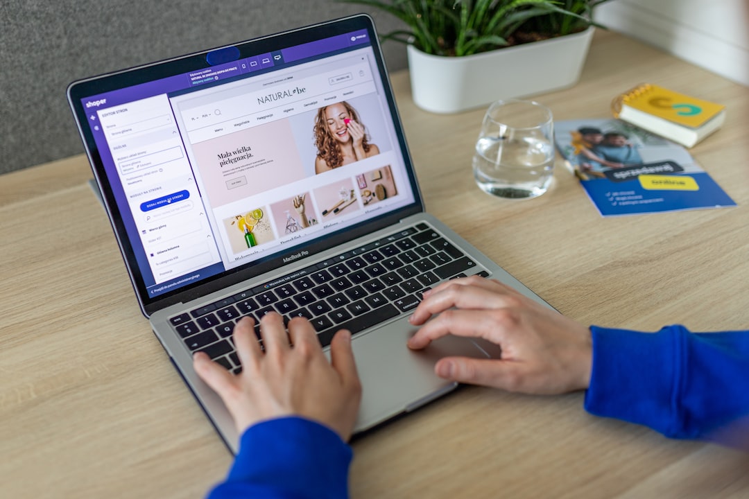 Small business owner running an online store on a laptop