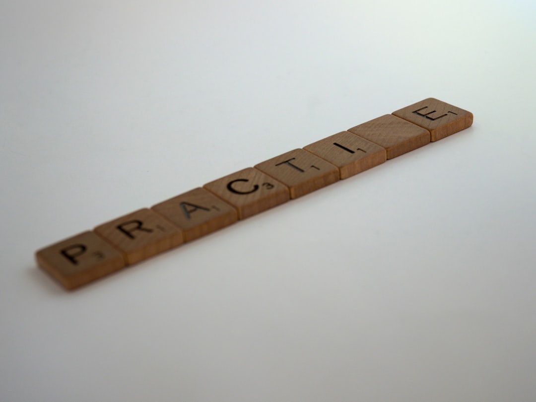 Brown wooden ruler on white surface