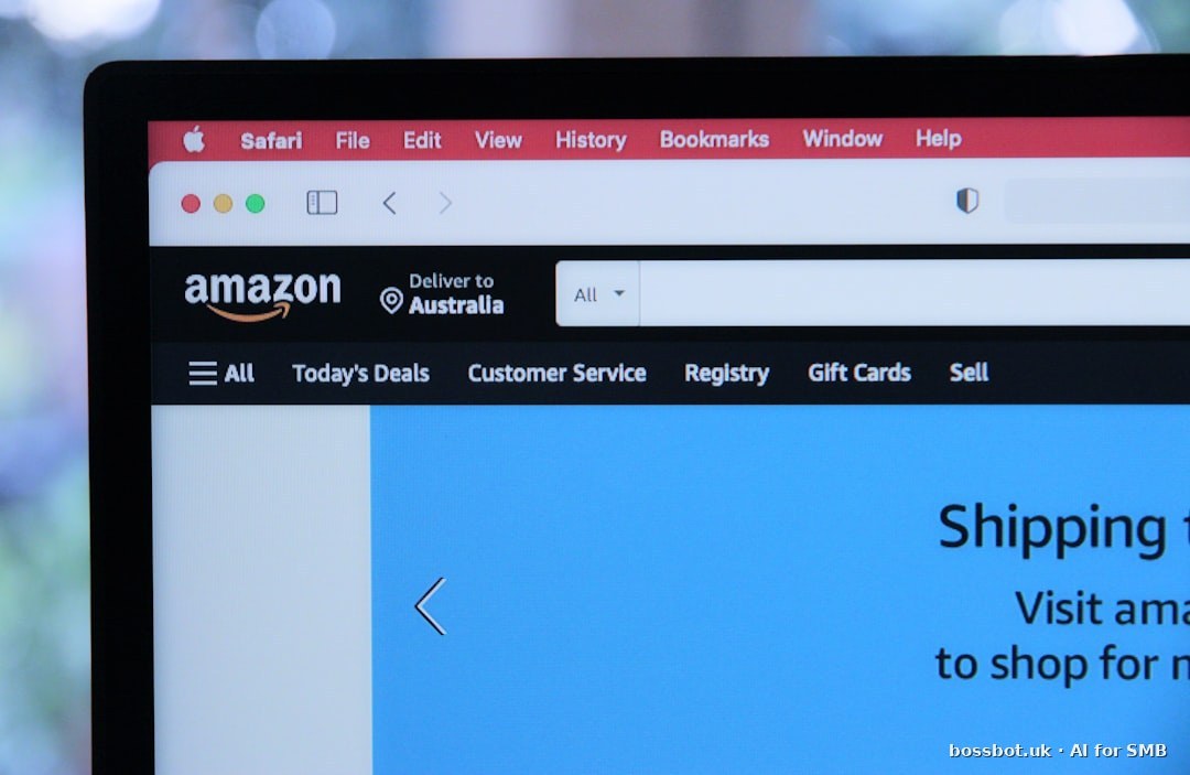 Canadian e-commerce seller reviewing orders on laptop with phone nearby