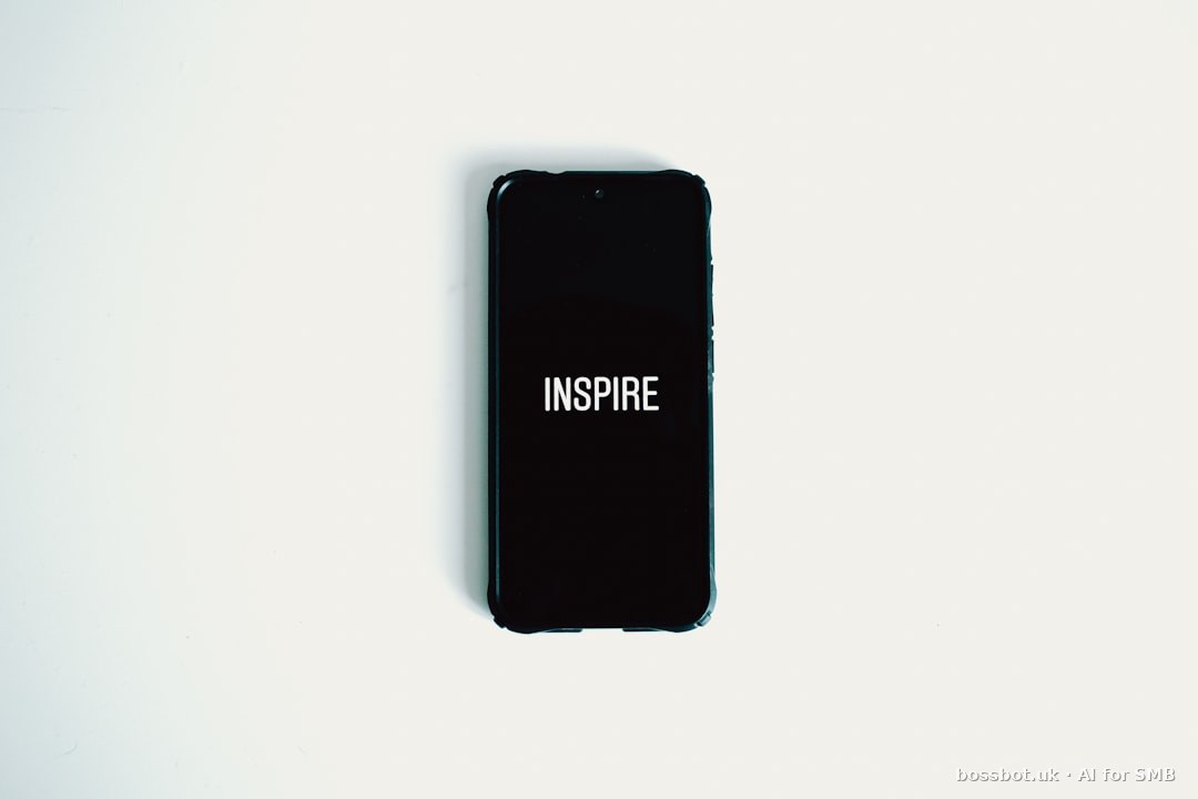 Black smartphone on white surface