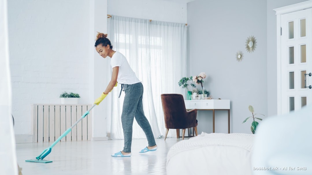 A woman mops a bright, modern living room floor