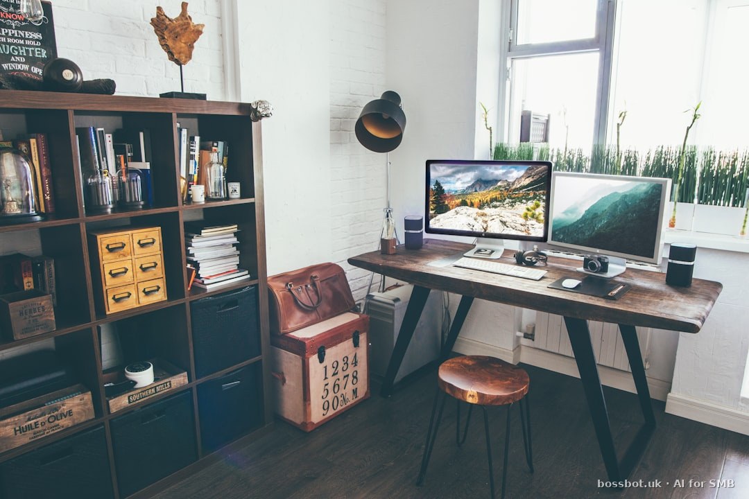 Two flat screen monitor turned on near organizer rack inside the room
