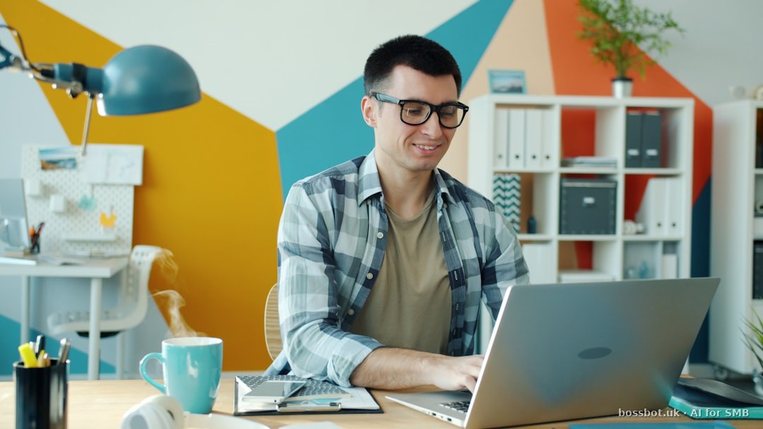 Person working with laptop and coffee.