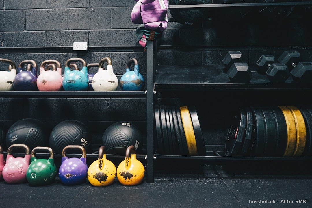 Boutique fitness studio with rowing machines and dumbbells