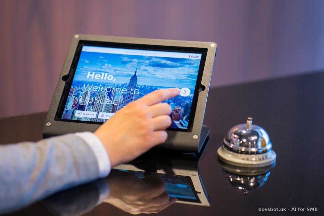 Person about to touch black android tablet computer