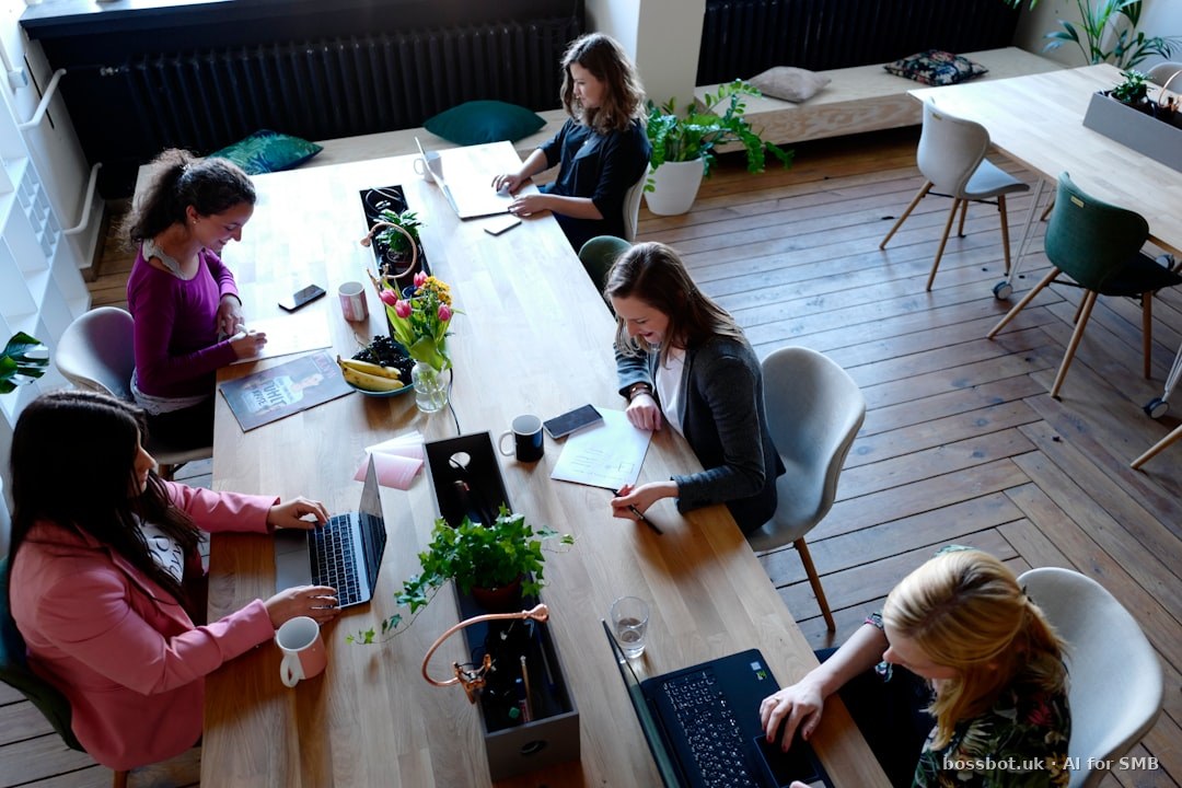 A group of people sitting around a wooden table
