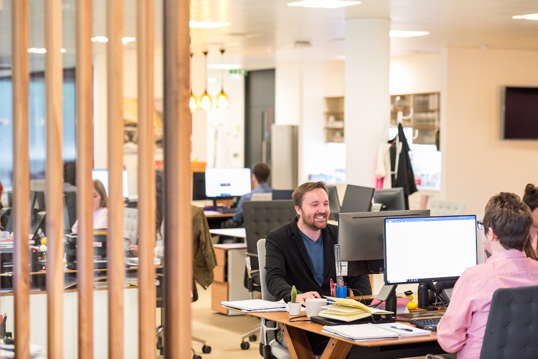 A man sitting at a desk in an office