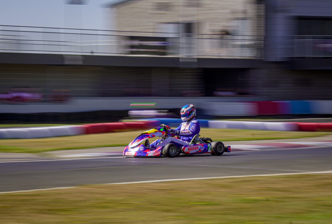 Go-kart racer speeding on a track