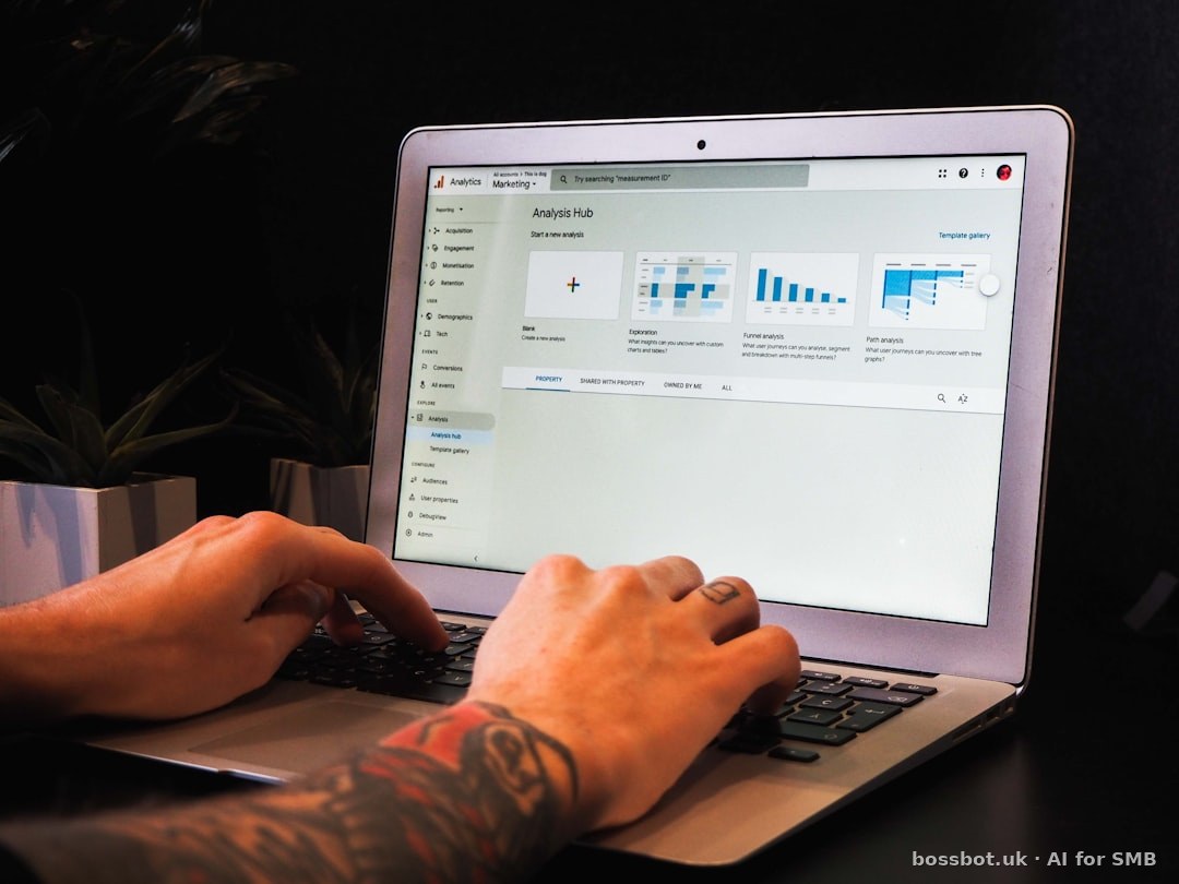 Person using macbook pro on table