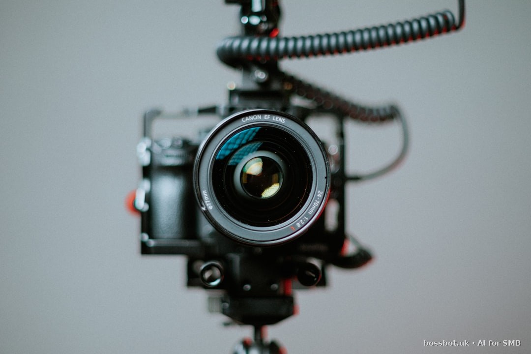 Black dslr camera on black tripod