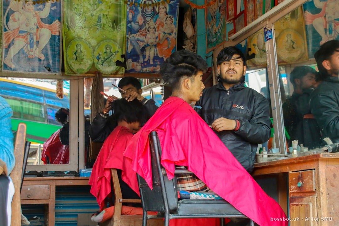 A barber cuts a client's hair in a traditional shop.