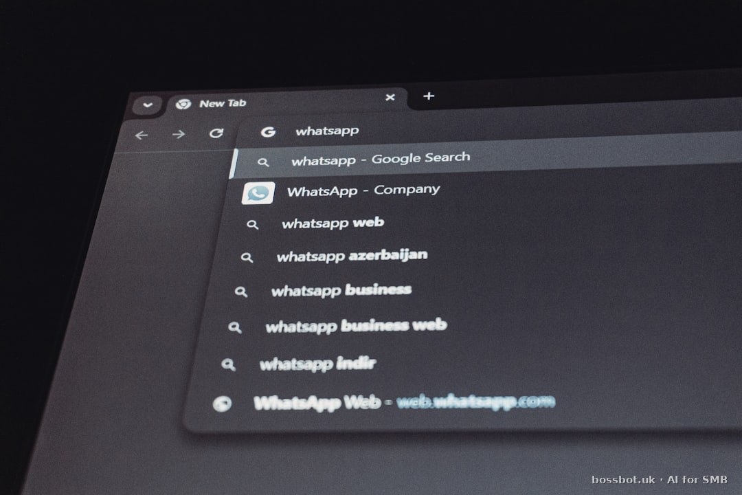 Person at desk with chatbot builder on screen