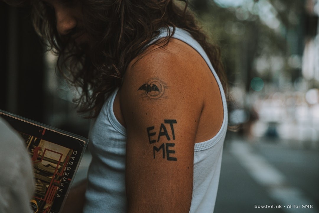 A man with a bat tattoo on his arm