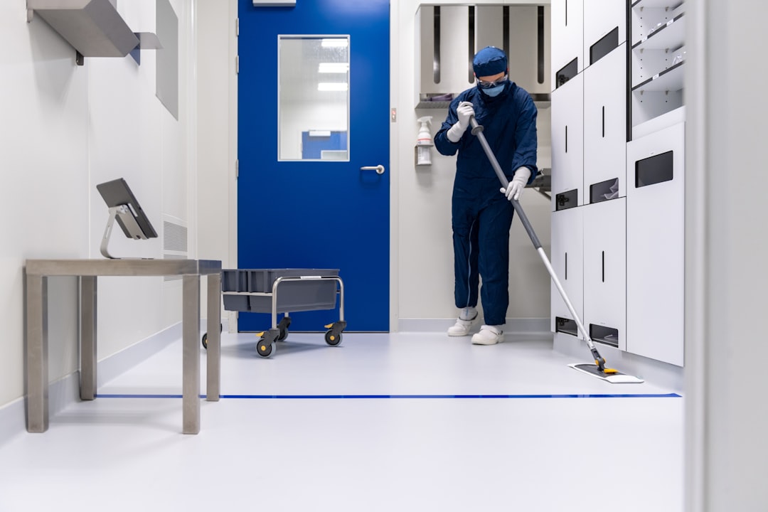 A person in a blue mask and a mask holding a ladder