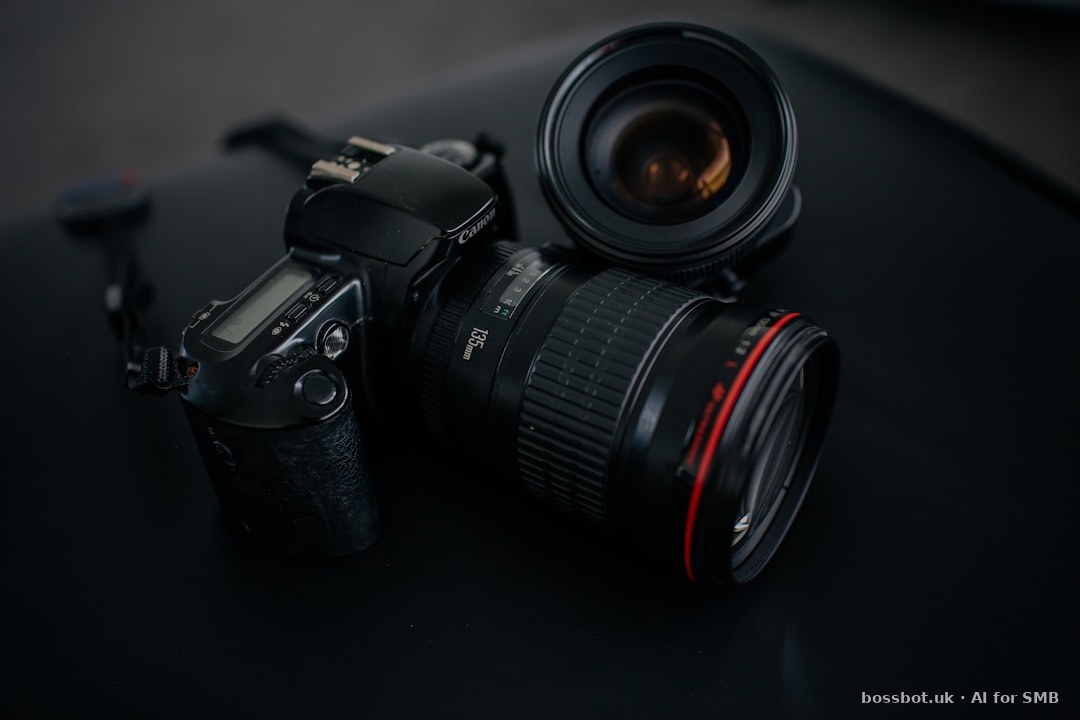 Black canon dslr camera beside camera lens