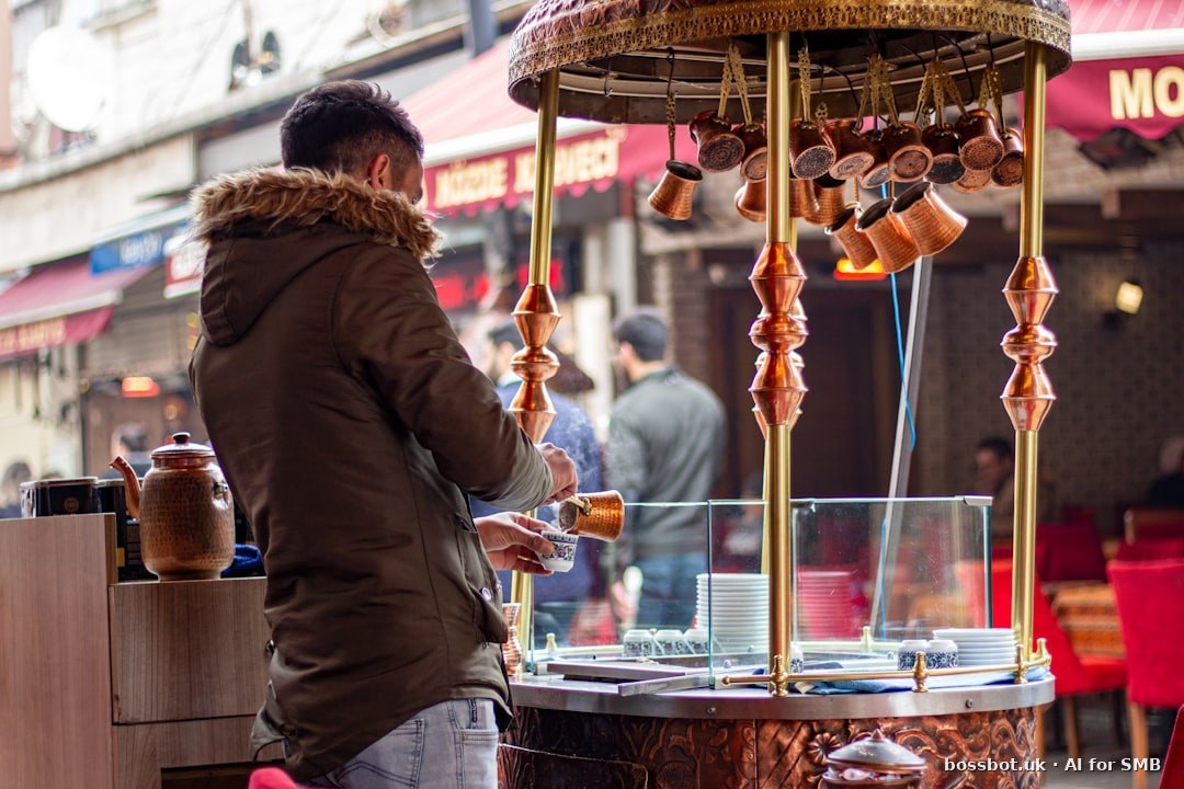 A man standing in front of a food stand